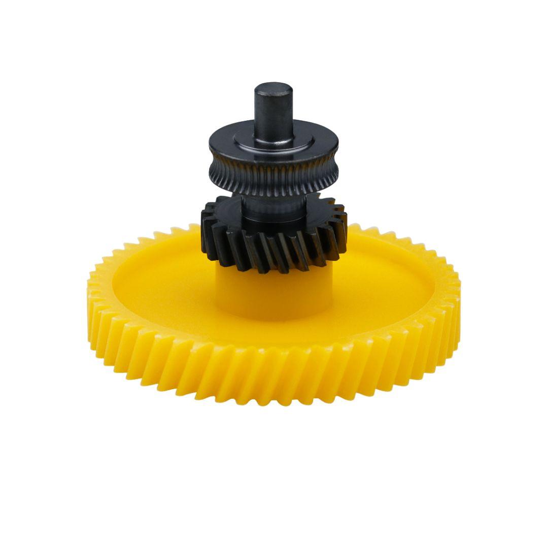 Flat dimensional photo highlighting the helical (angled) teeth of the hardened steel gear.
