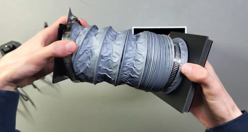 Exhaust duct hose for a 3D printer ventilation setup, used to route fumes and air outside the printing area.