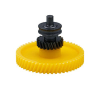 Flat dimensional photo highlighting the helical (angled) teeth of the hardened steel gear.
