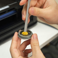  Small cut piece of sulfur-free nozzle cleaning sponge moistened with water (moist, not dripping) before nozzle cleaning