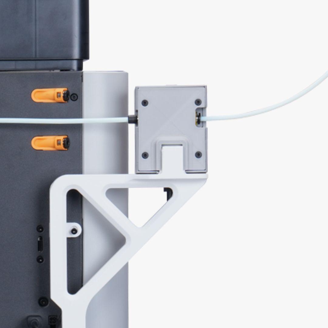 Bambu TPU Feed Assist Module installed on rear of Bambu H2D 3D printer