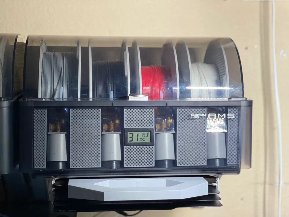 Bambu Hygrometer installed inside Bambu Lab AMS, monitoring humidity for filament storage