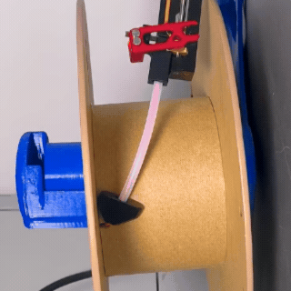 GIF of the filament cutter trimming the tangled or deformed filament tail-end to trigger a runout pause