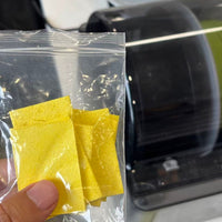 the Pack of the Nozzle Sponge in hand 