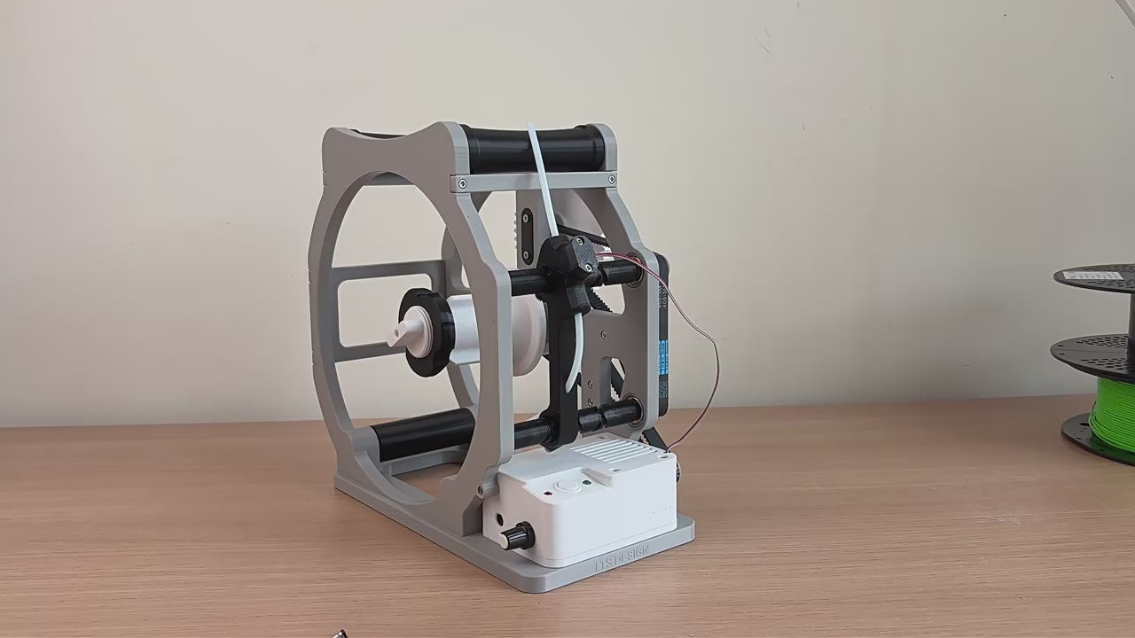  How-to-use video demonstrating how to set up the electric filament spool winder and respool filament from a large spool to a smaller spool.