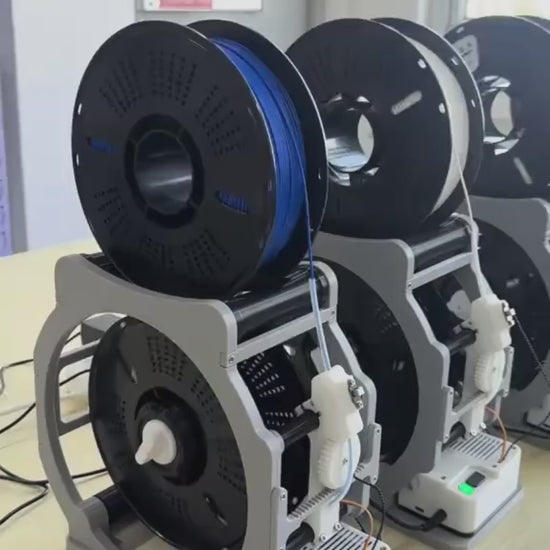 Multiple electric filament spool winders running at the same time to respool filament efficiently.